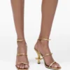 Der Metallic-Leder-Daisy-Absatz