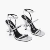 Der Metallic-Leder-Daisy-Absatz