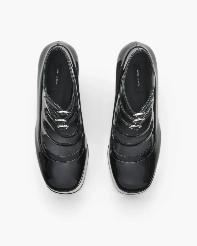 Die Kiki-Stiefelette aus Lackleder Die Kiki-Stiefelette aus Lackleder