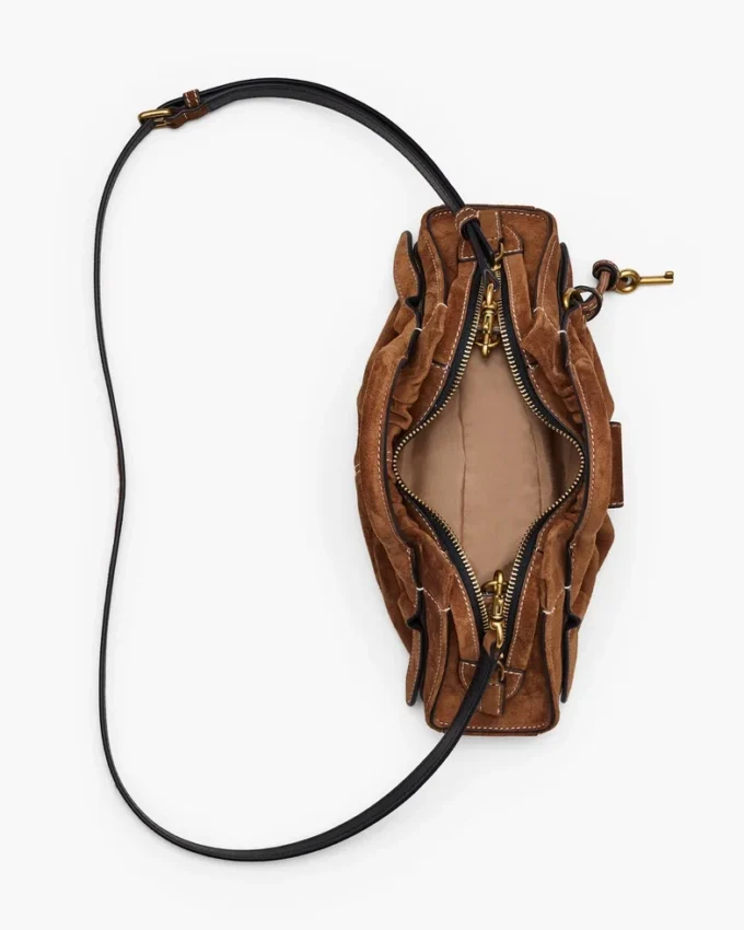 Die kleine Cristina-Tasche aus Wildleder Die kleine Cristina-Tasche aus Wildleder
