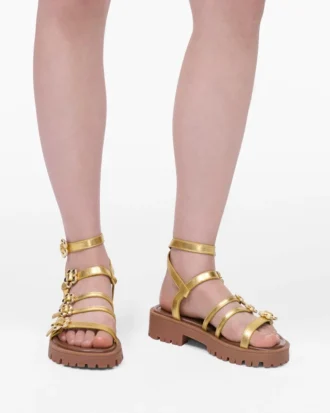 Die Metallic-Leder-Daisy-Gladiatorensandale