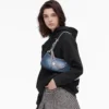 Die Schultertasche „Faded Denim Charm” Die Schultertasche „Faded Denim Charm”