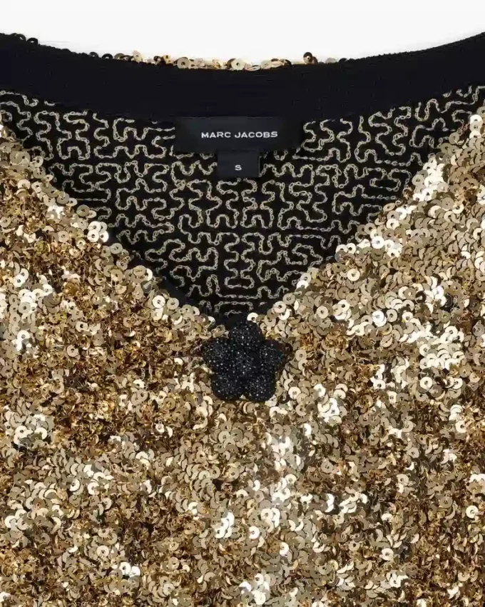 Strickkleid mit V-Ausschnitt und Pailletten Strickkleid mit V-Ausschnitt und Pailletten