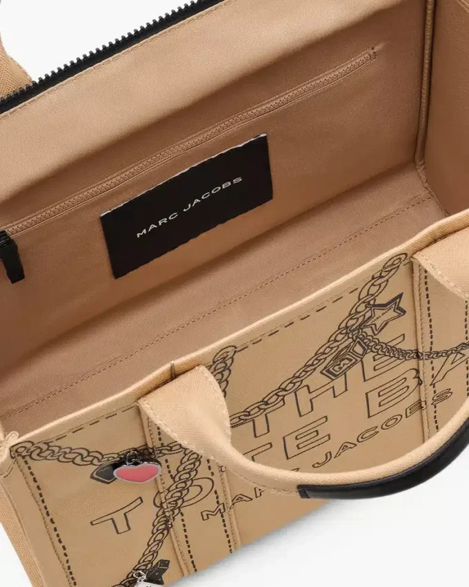 The medium-sized Canvas Tote Bag with Trompe-l’œil charm