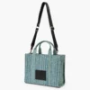 The medium-sized Washed Monogram Denim Tote Bag The medium-sized Washed Monogram Denim Tote Bag