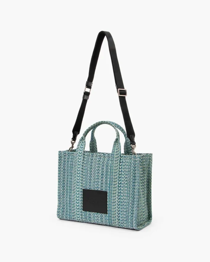The medium-sized Washed Monogram Denim Tote Bag The medium-sized Washed Monogram Denim Tote Bag