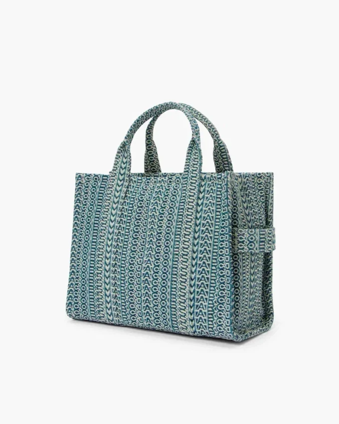 The medium-sized Washed Monogram Denim Tote Bag The medium-sized Washed Monogram Denim Tote Bag