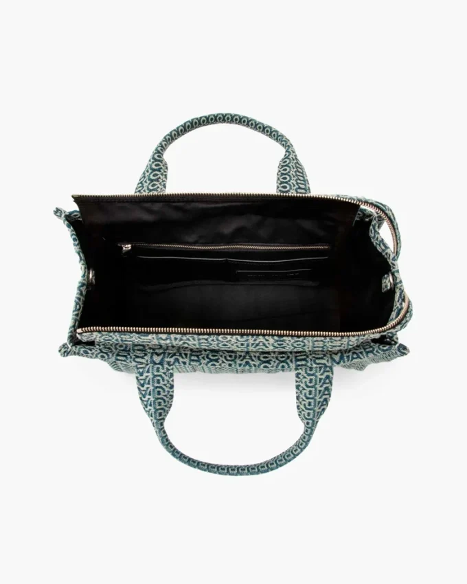 The medium-sized Washed Monogram Denim Tote Bag The medium-sized Washed Monogram Denim Tote Bag