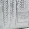 The small Monogram Metallic Tote Bag The small Monogram Metallic Tote Bag