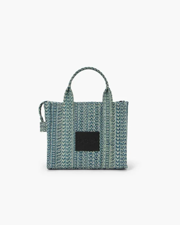 The small Washed Monogram Denim Tote Bag The small Washed Monogram Denim Tote Bag