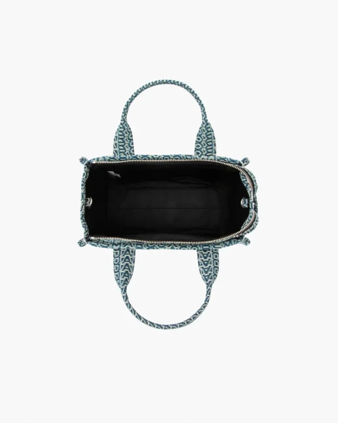 The small Washed Monogram Denim Tote Bag The small Washed Monogram Denim Tote Bag